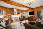 Gather Around for Family Movie Night in the Master Lodge`s Cozy Living Room